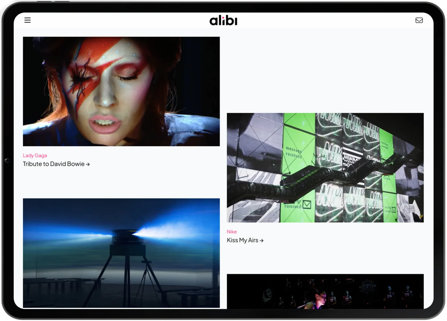 The Alibi Studios website project grid shown on a tablet